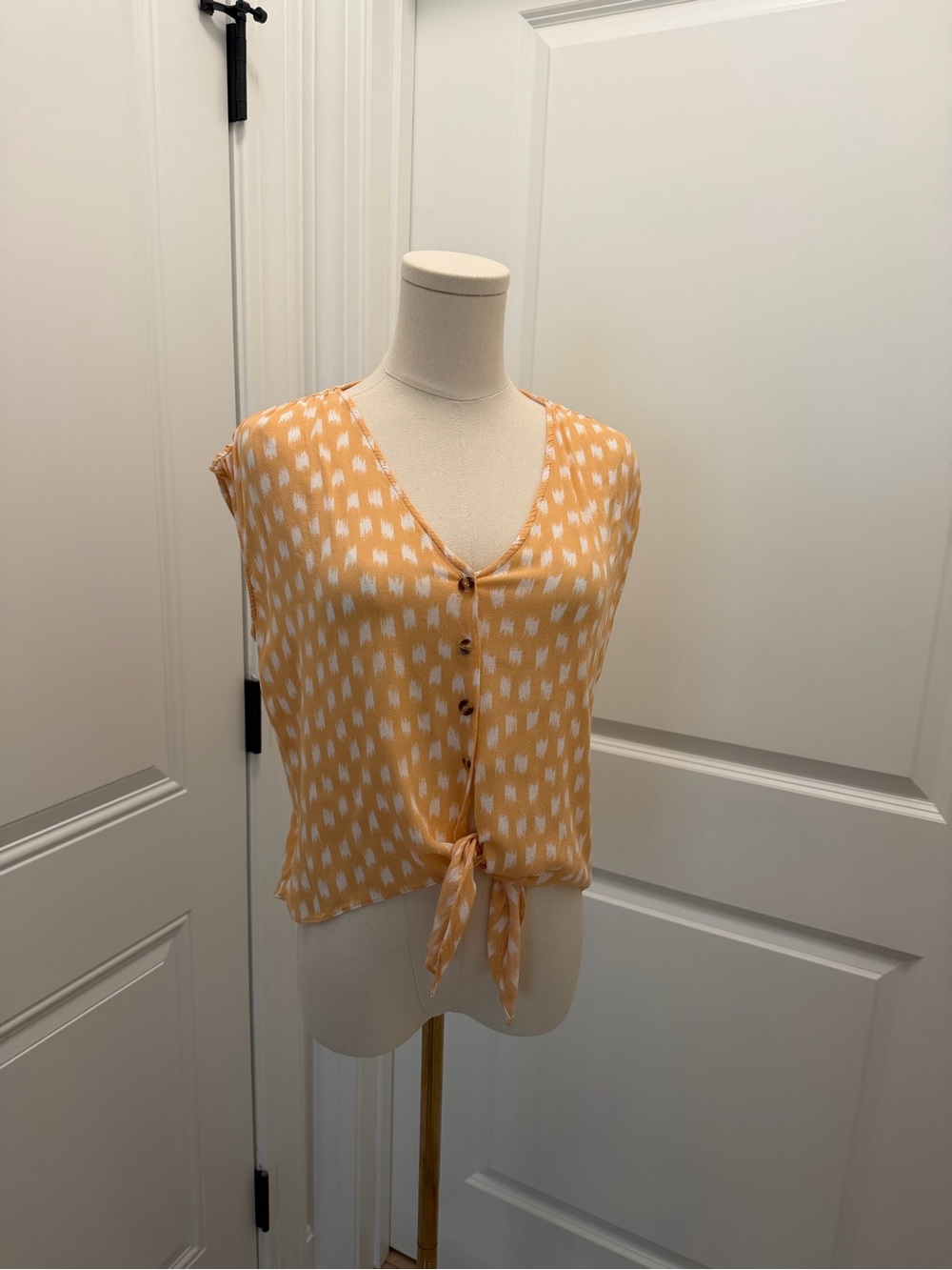 Everly Peach Ikat Button Tie-Front Sleeveless Blouse